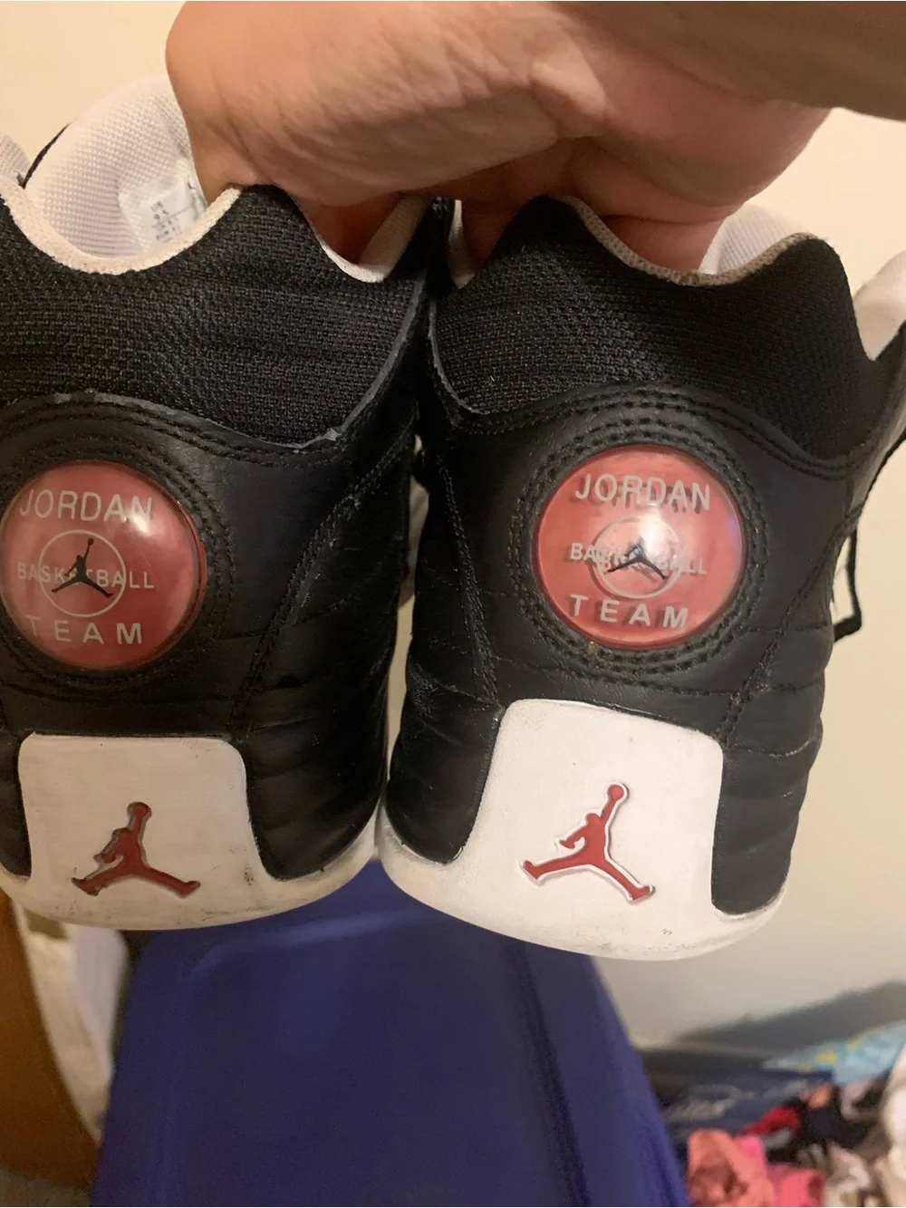Jordan Black Sneakers with Red Jumpman Accent
